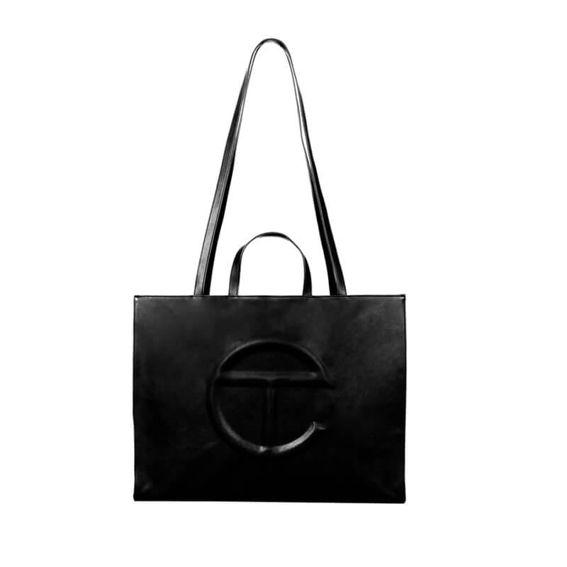 Telfar Bag Large Black / Telfar Large Logo Embossed Tote in Black for ...